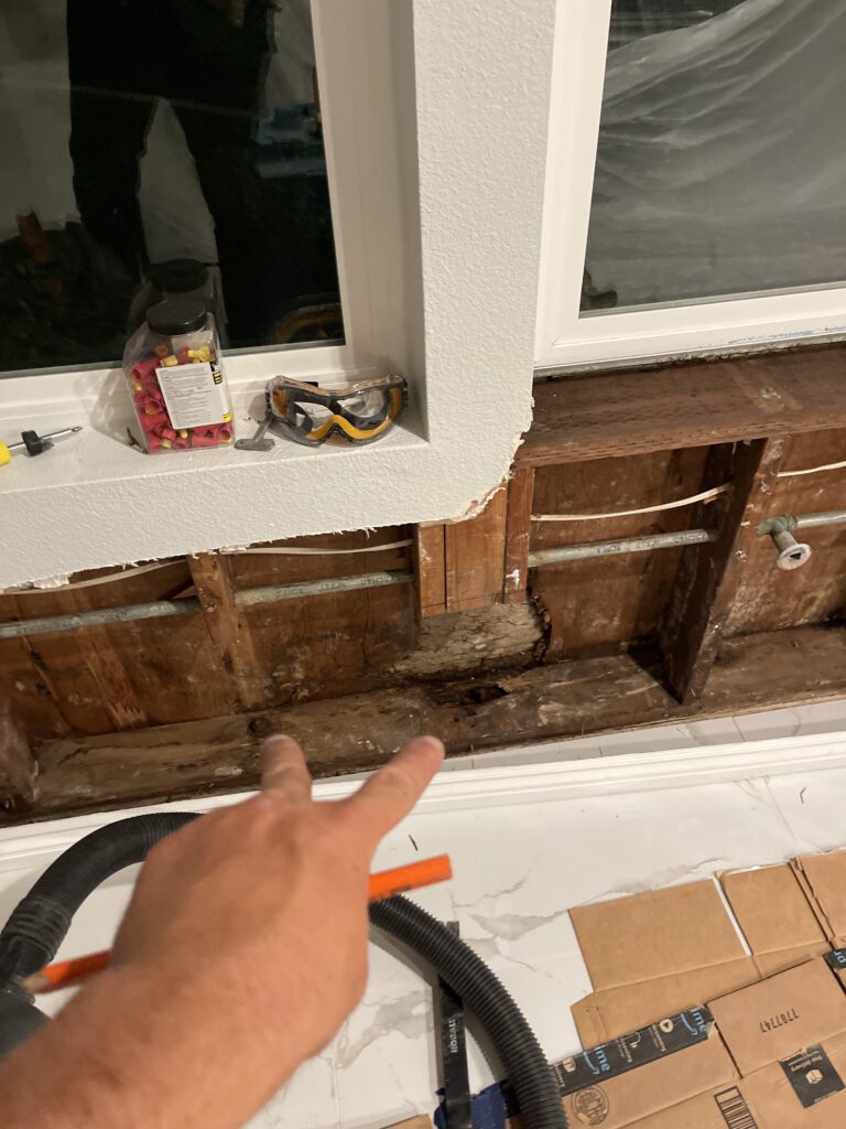 drywall removed showing water damage